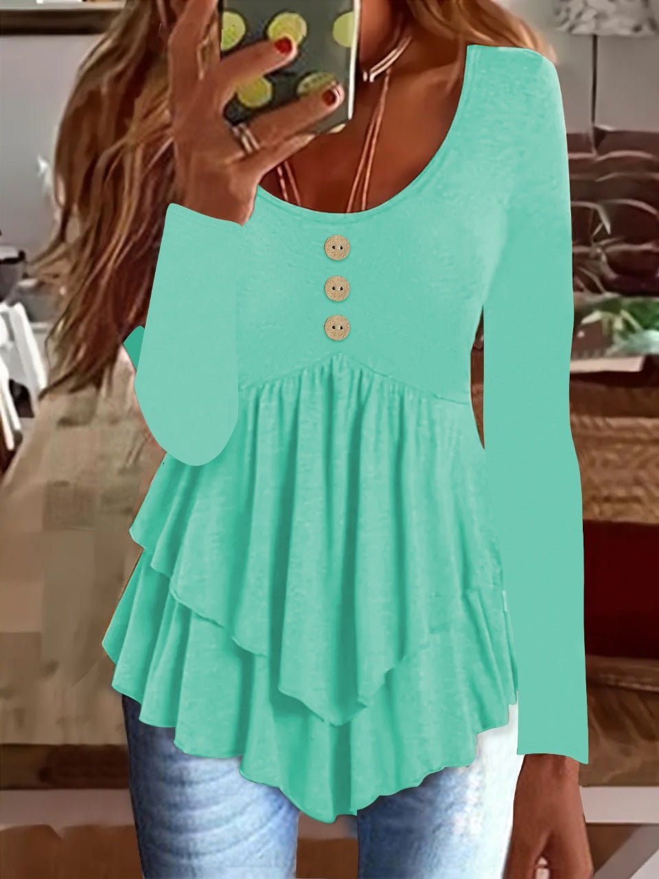 Long sleeve women's blouse with layered design and decorative button details Lune London