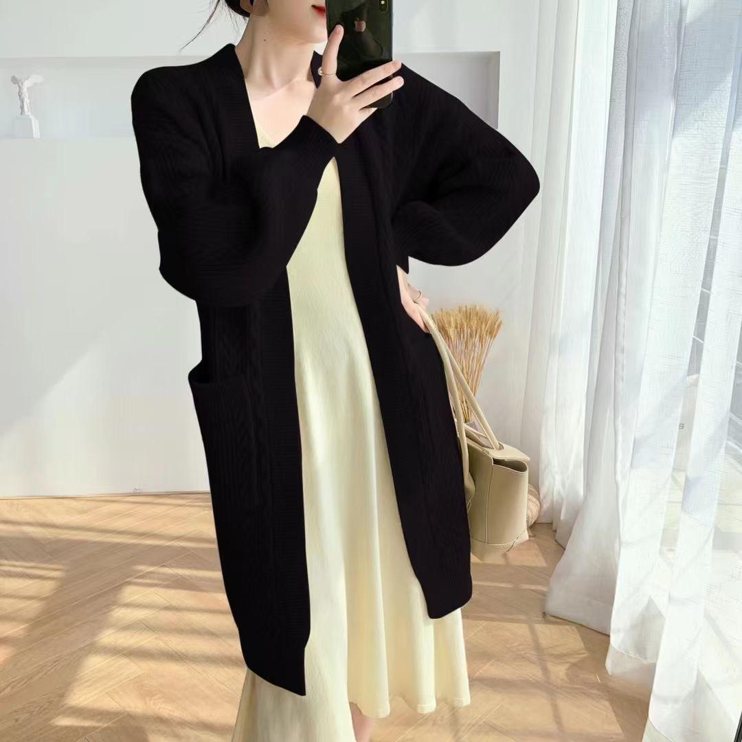 Ladies Thick Knit Cardigan with deep pockets and elegant Braid design Lune London