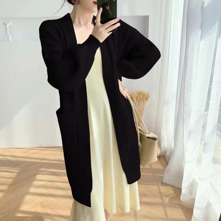 Ladies Thick Knit Cardigan with deep pockets and elegant Braid design Lune London