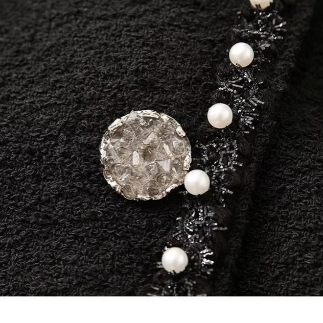 Veste élégante pour femmes avec col orné de perles et poches pratiques Chic & Stil
