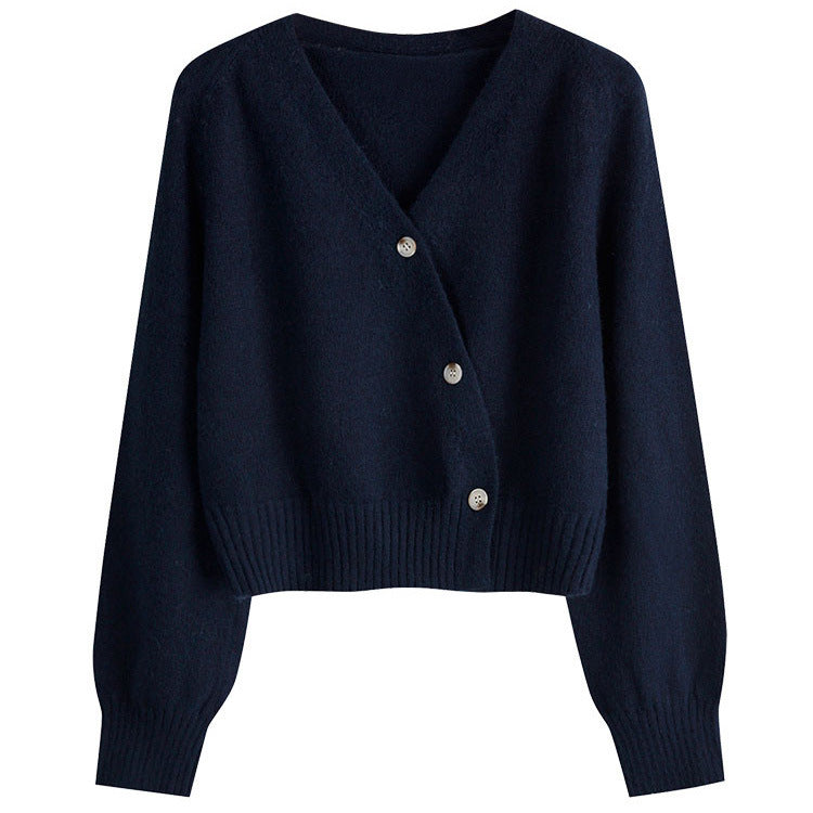 Ladies cozy short knit sweater with deep V-neck and large buttons Lune London