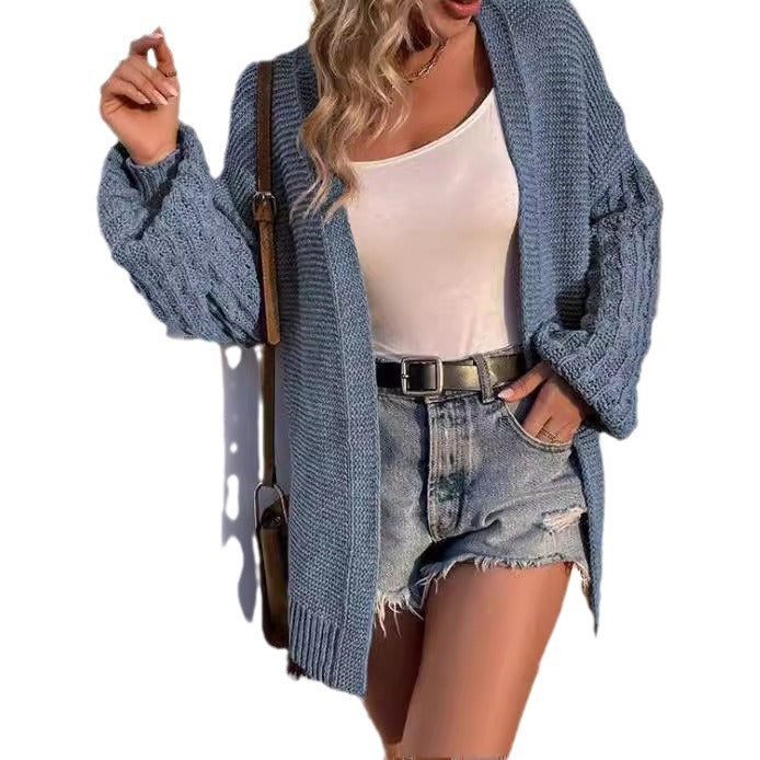 Thick knit cardigan for women with open cut and decorative twisted patterns Lune Londonl