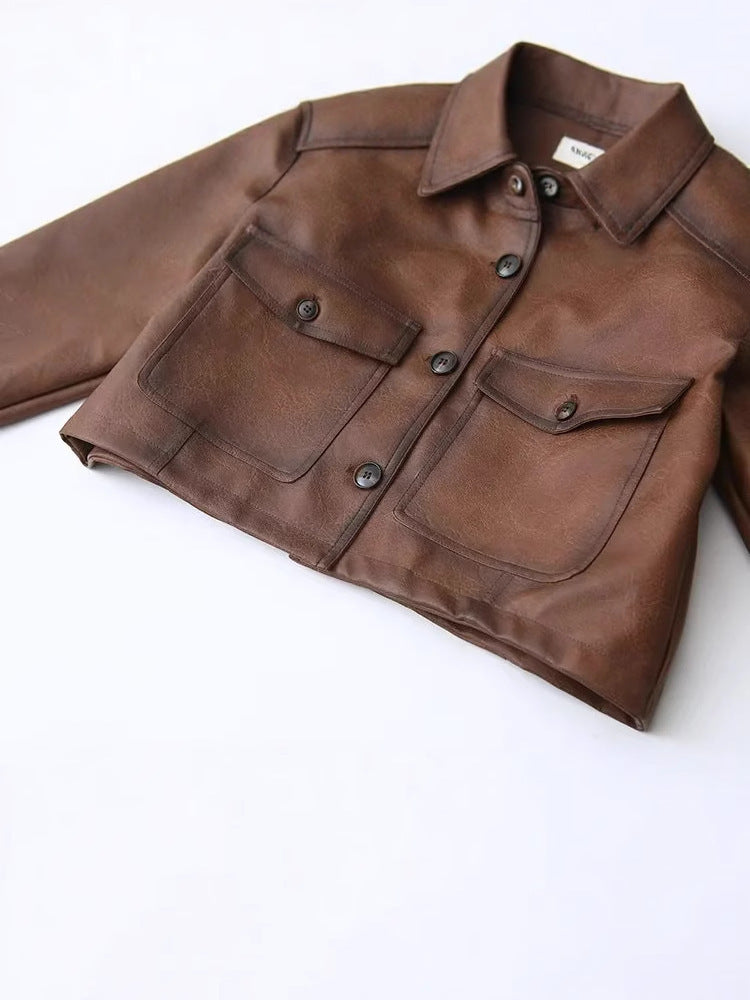 Ladies cropped leather jacket with practical chest pockets and Lune London button details