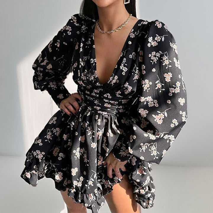 Robe à fleurs ludique pour femmes avec des manches volumineuses et une jupe froncée Chic & Stil