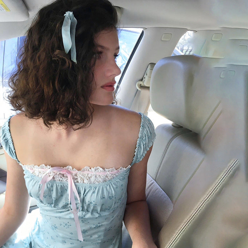Ladies nightdress with delicate lace decoration and playful ruffle elements