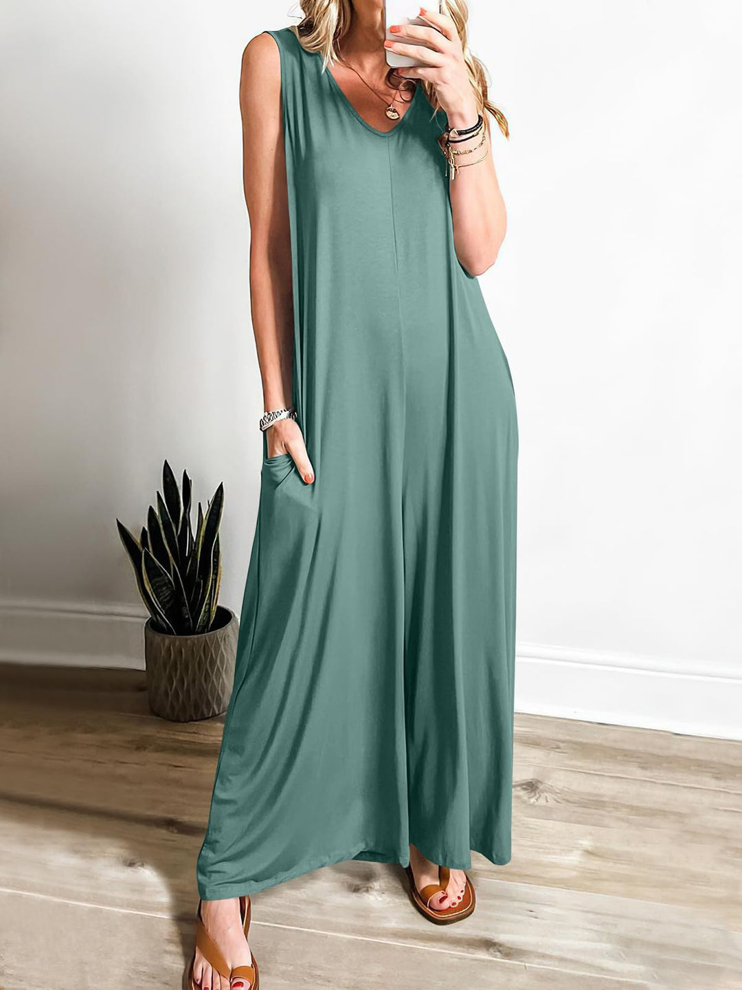 Ladies lightweight jumpsuit with deep V-neck and side pockets Lune London