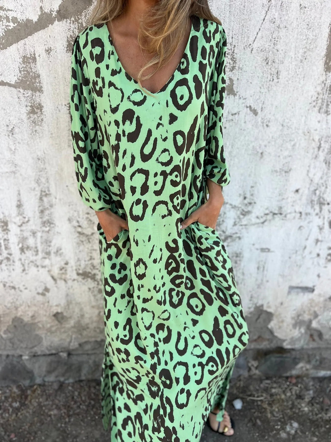Maxi dress for women with an exclusive leopard pattern and practical side pockets Lune London