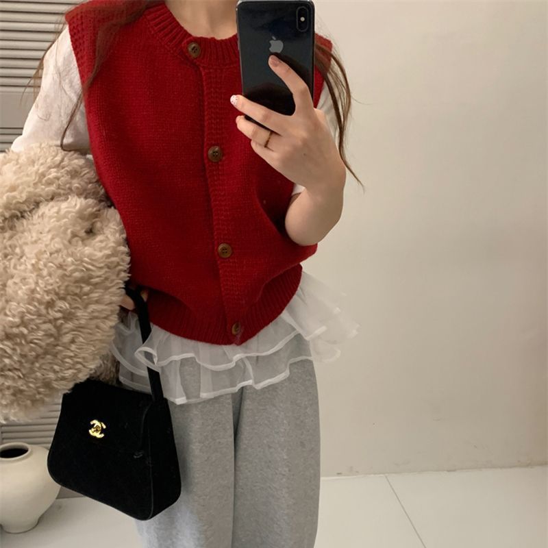 Gilet tricoté pour femme avec fermeture à boutons et coupe tendance Chic & Stil