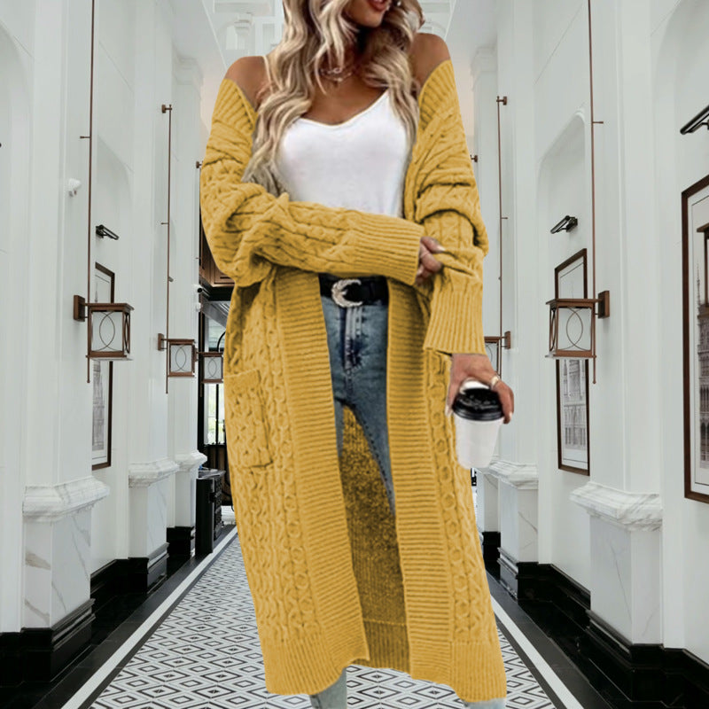 Cardigan femme en tricot épais avec design ouvert et poches pratiques Chic & Stil