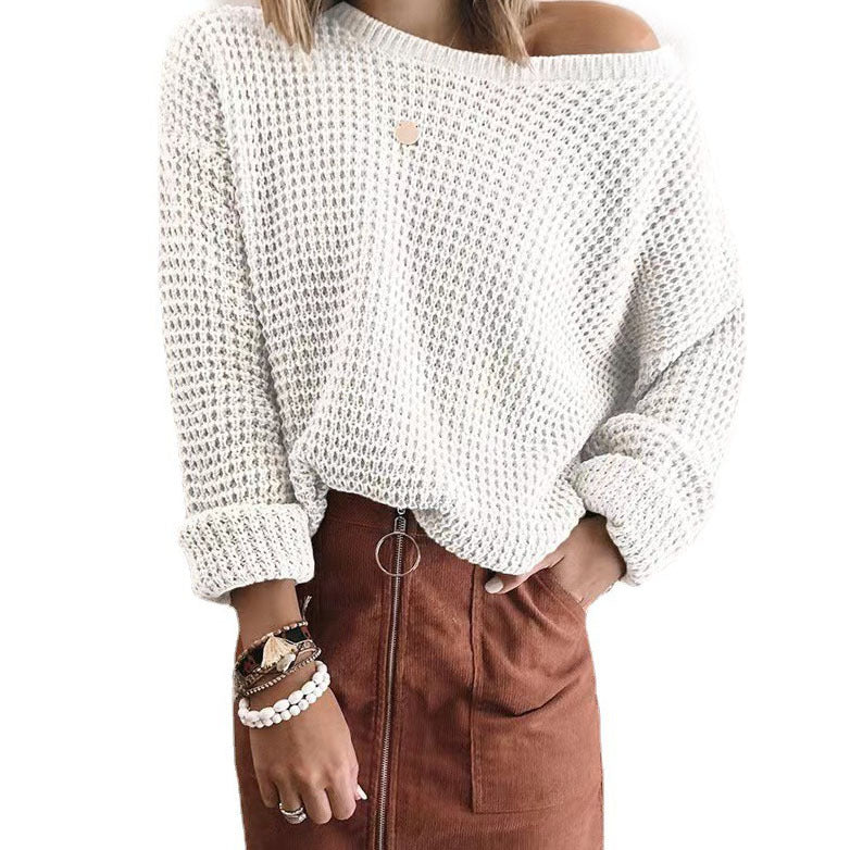 Oversized casual style knitted sweater for women with an off-shoulder design.