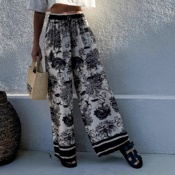 Wide palazzo pants for Damen with floral pattern and elastic waistband Lune London