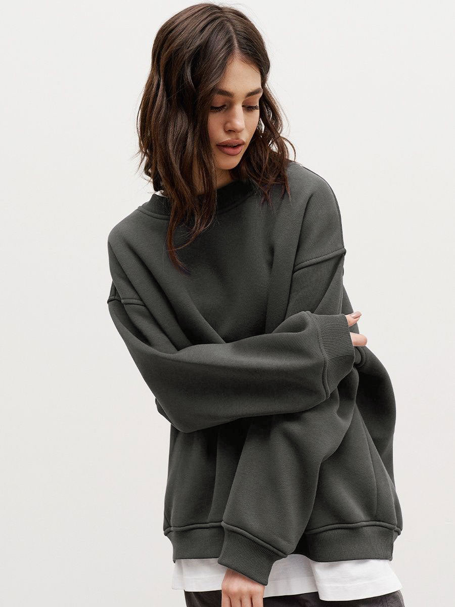 Woman Oversized sweatshirt with a relaxed fit and modern chic accents and style
