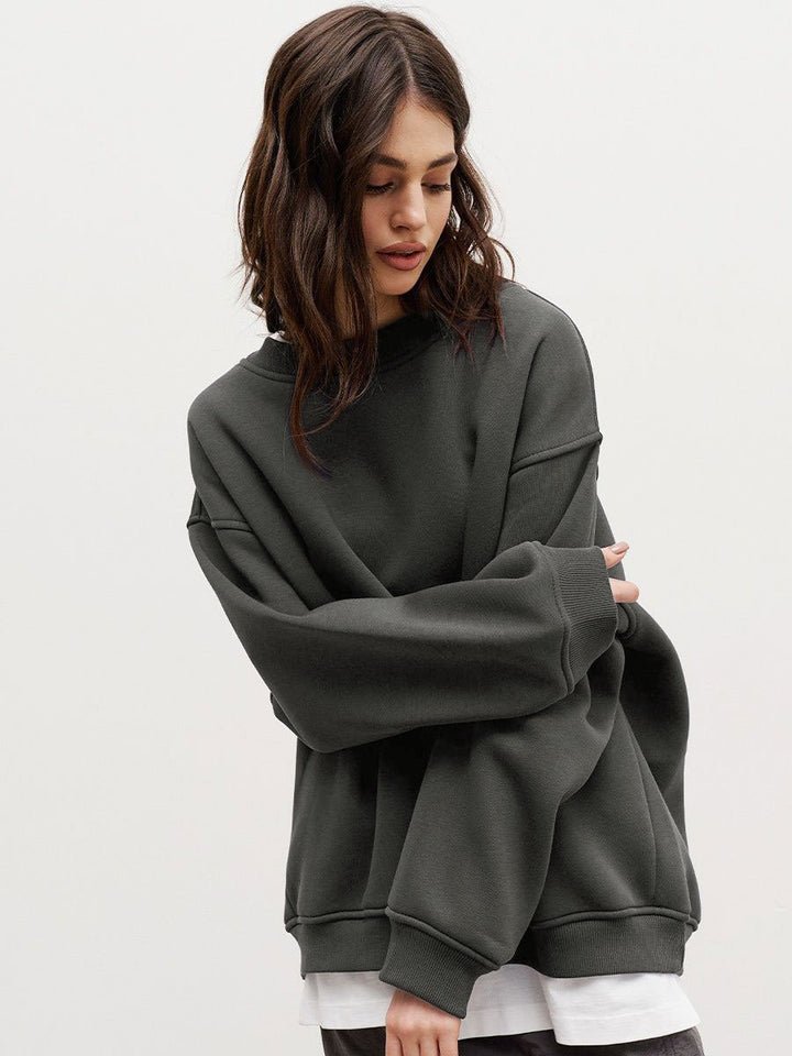 Woman Oversized sweatshirt with a relaxed fit and modern chic accents and style