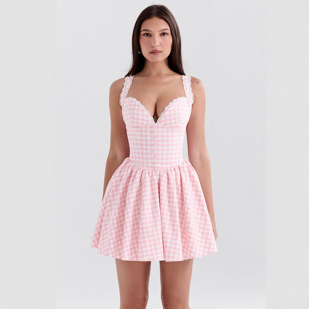 Mini dress for women with V-cut, ruffle details, and checkered pattern Chic & Stil