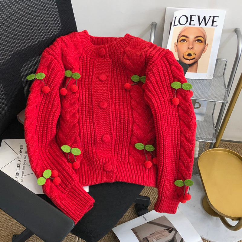 Women's chunky knit sweater with floral appliqués and button details Lune London