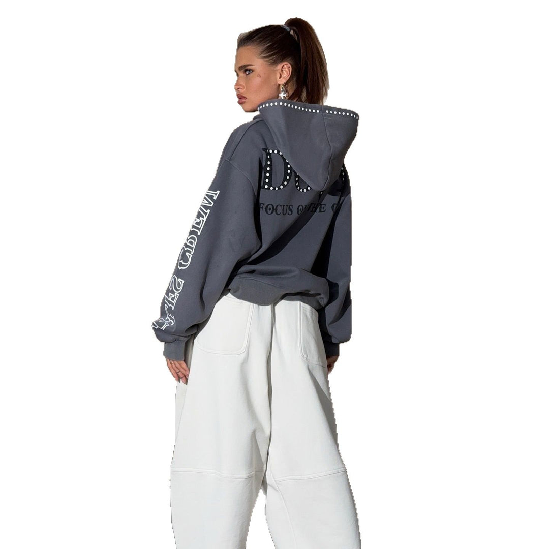 Ladies oversized hoodie with striking stone decoration and creative prints on the sleeves Lune London