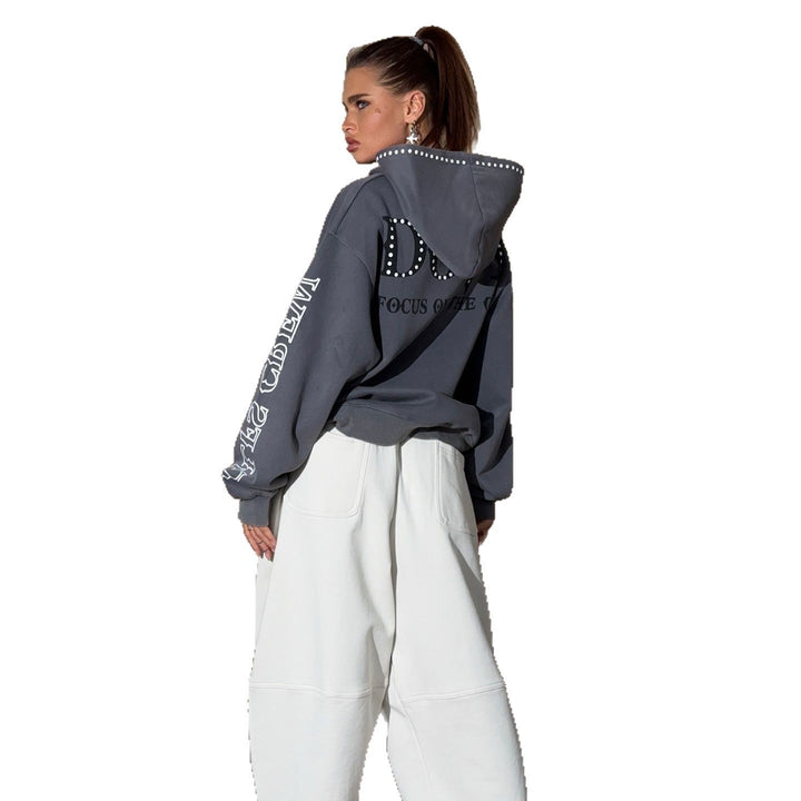 Ladies oversized hoodie with striking stone decoration and creative prints on the sleeves Lune London