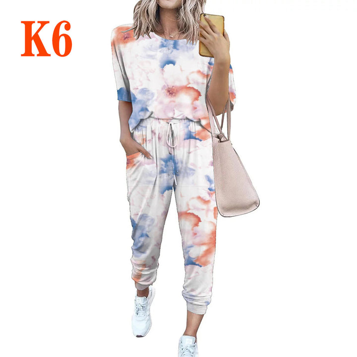 Ladies lightweight casual jumpsuit with a striking tie-dye pattern and practical pockets Lune London