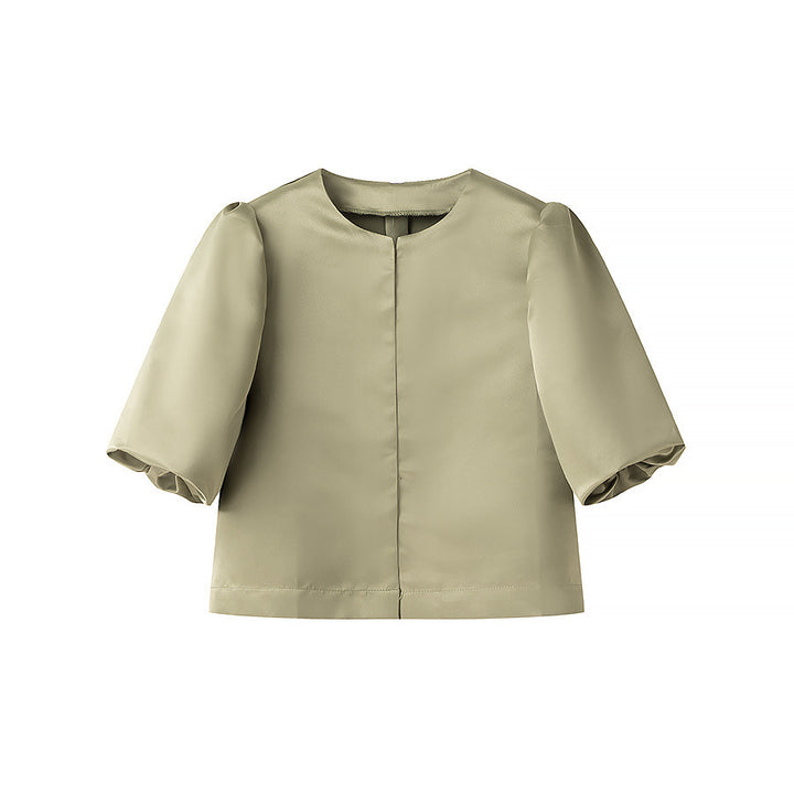 Veste élégante pour femmes avec des manches bouffantes et une coupe courte Chic & Stil