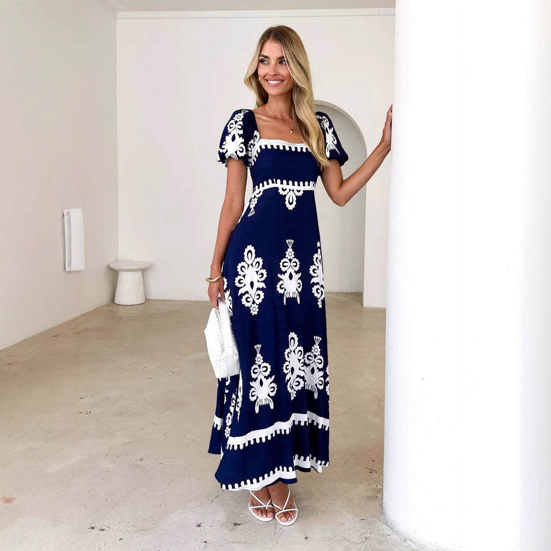 Maxi dress for women with decorative graphic pattern and puff sleeves Chic & Stil