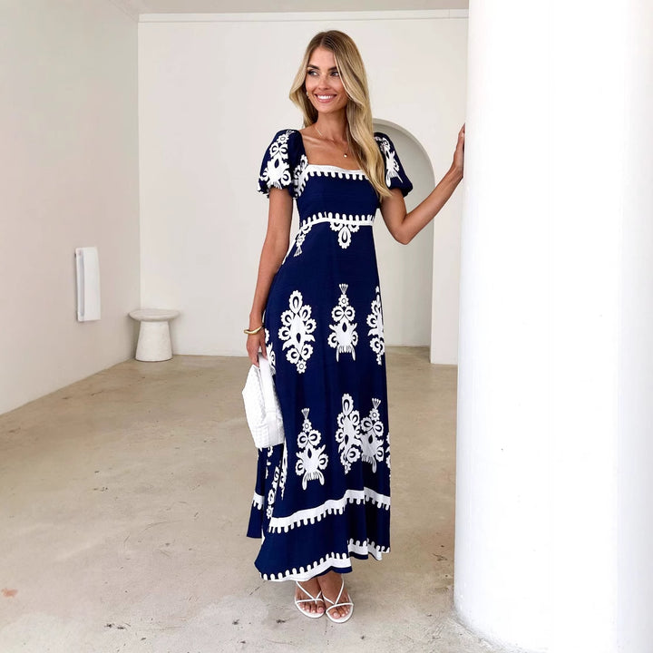 Maxi dress for women with decorative graphic pattern and puff sleeves Chic & Stil
