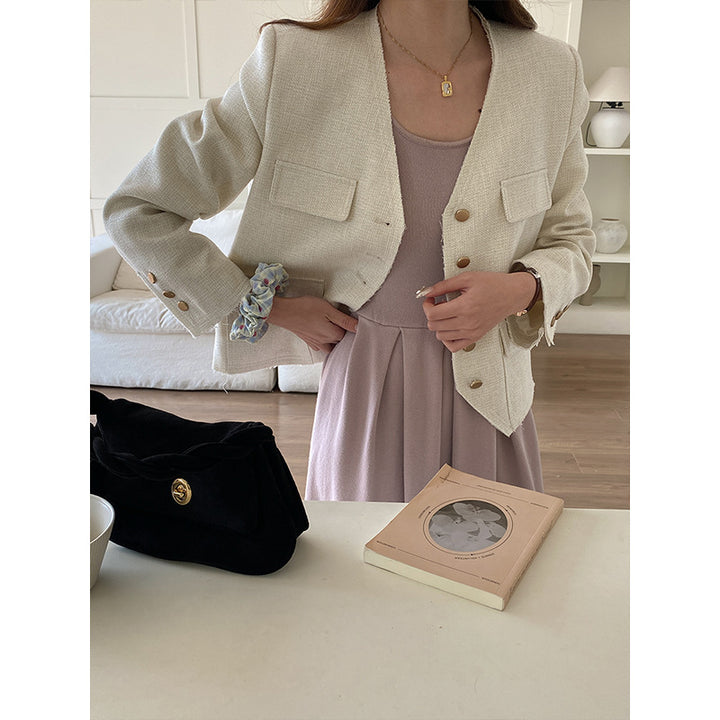 Women's fashionable jacket with textured design and double button placket Chic & Stil