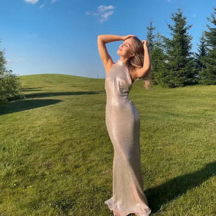 Evening dress for ladies with a sparkling sequin design and an elegant halter neck Lune London
