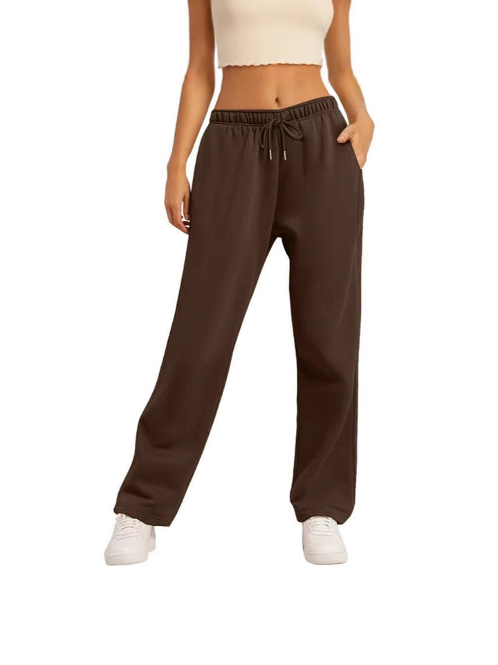 Women's wide casual pants with elastic waistband and practical side pockets Chic & Stil 1773783716