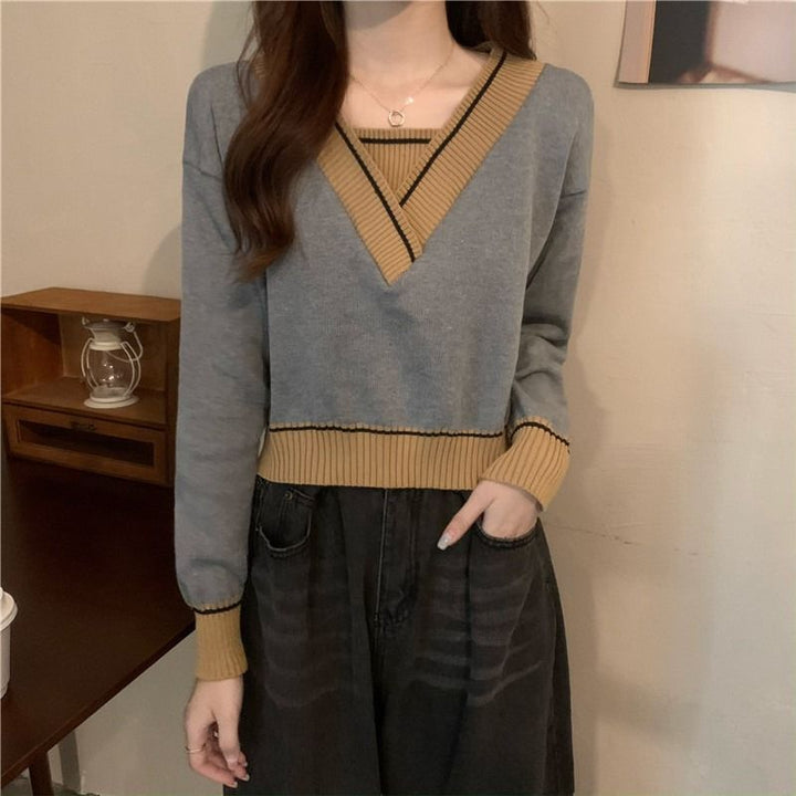 Pull féminin à la mode en V avec détails contrastés Chic & Stil