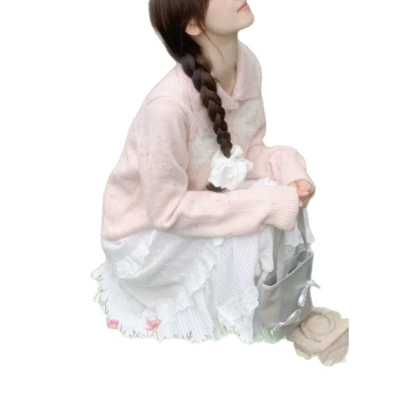 Women’s playful knitted vest with decorative button details and fluffy applications Lune London