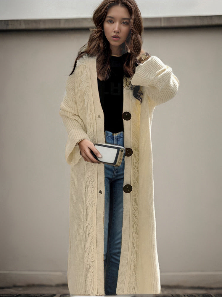 Ladies chunky knitted cardigan with fringed details and an open cut Lune London