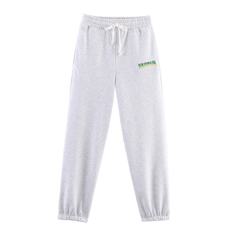 Sports pants for women with elastic waistband and practical logo Lune London