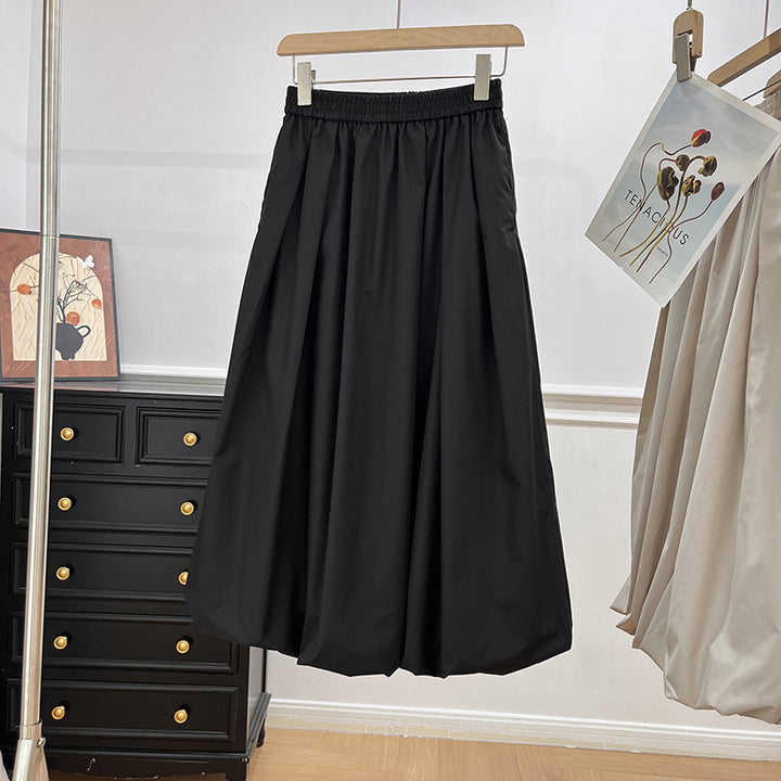 Jupe midi élégante pour femmes avec taille élastique et coupe volumineuse Chic & Stil
