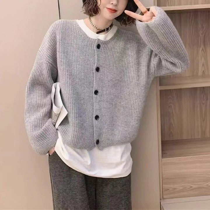 Cardigan femme avec décolleté en V et fermeture à boutons Chic & Stil
