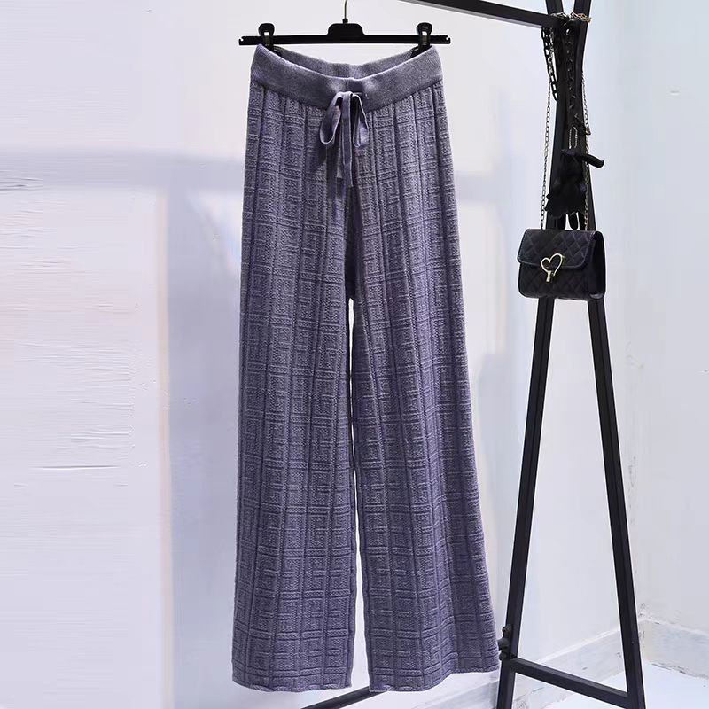 Loose linen pants for women with elastic waistband and striped design Lune London