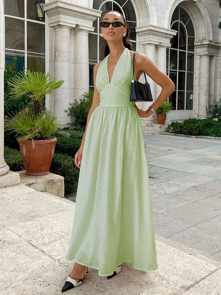 Elegant maxi dress for women with open back design and flowing skirt Lune London