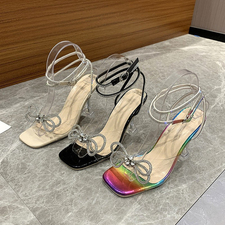 High-heeled sandals for women with elegant bow appliqué and clear details Lune London