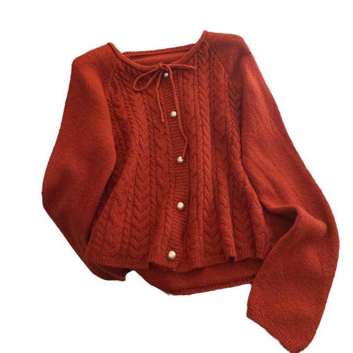 Women’s knitted jacket with embossed pattern and decorative button details Lune London