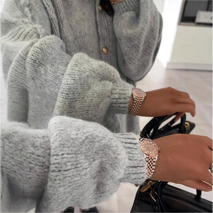 Oversized knit jacket for women with elegant puff sleeves and a chic button placket