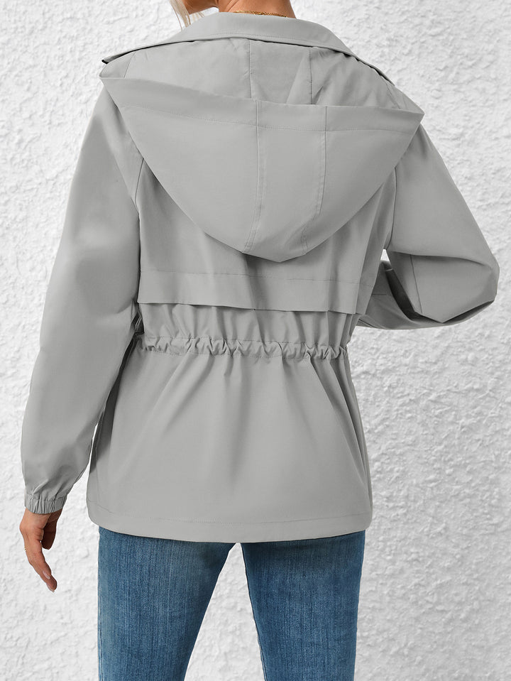 Multifunctional transition jacket for women with adjustable drawstring and elastic sleeve edges Lune London