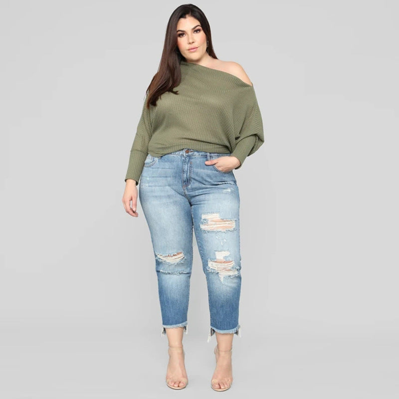 High-waisted jeans for women with a modern destroyed look featuring a trendy frayed hem Lune London