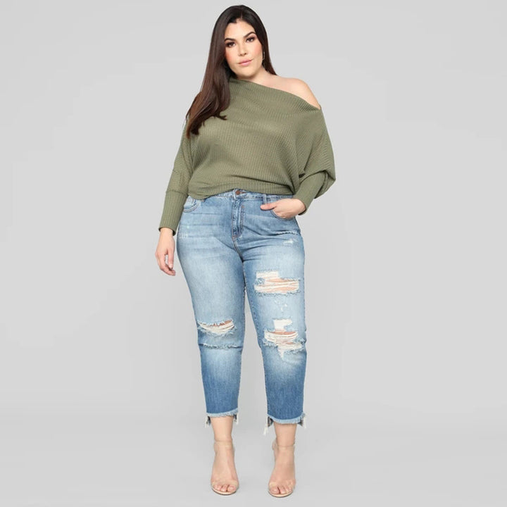 High-waisted jeans for women with a modern destroyed look featuring a trendy frayed hem Lune London