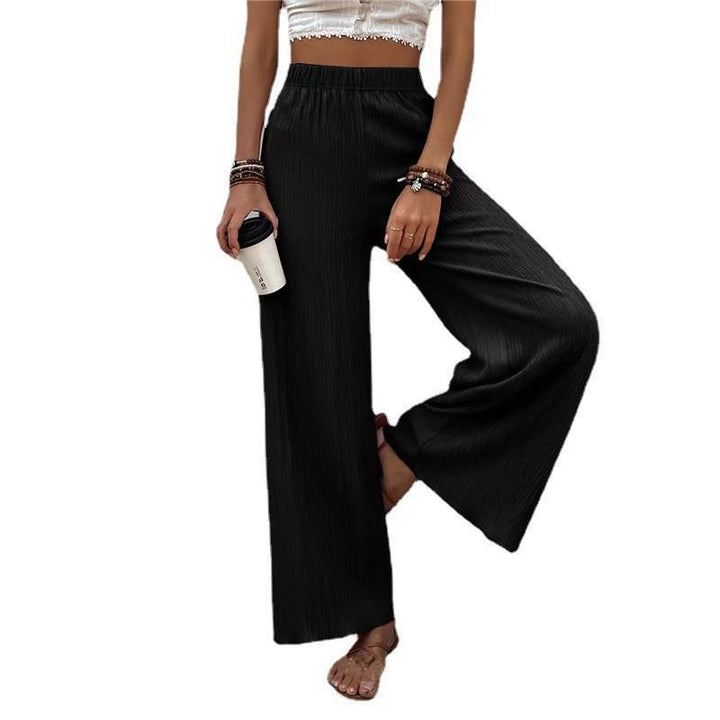 Wide pleated pants for women with elastic waist and elegant drape Lune London