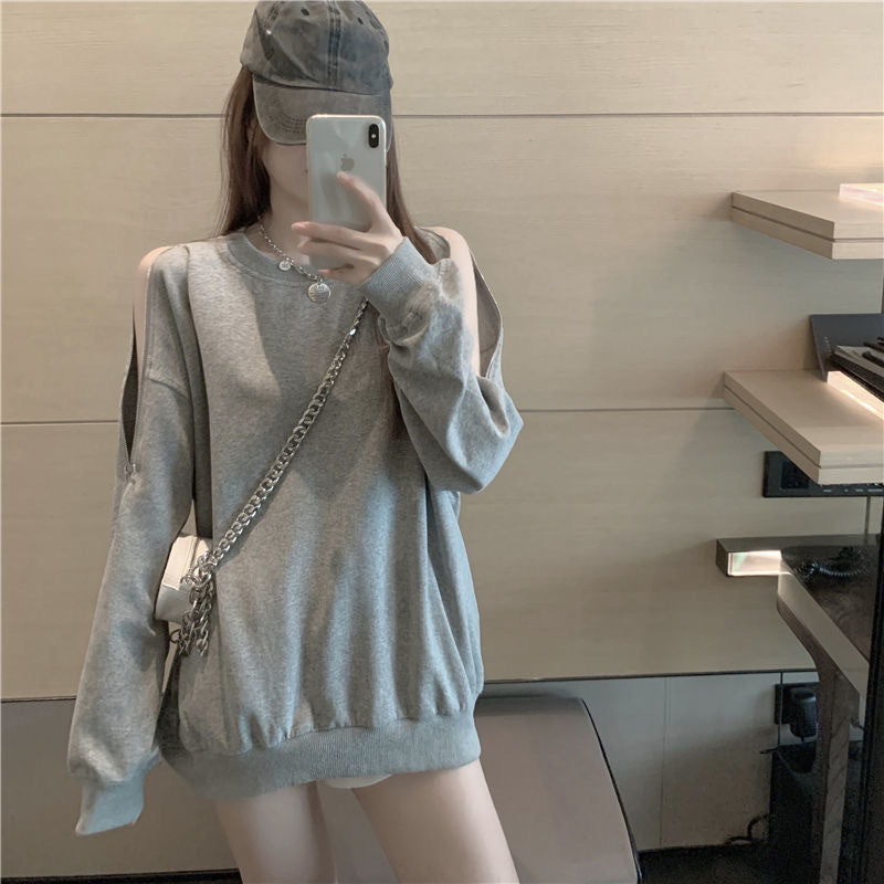 Women's casual oversized pullover with open shoulders and modern design