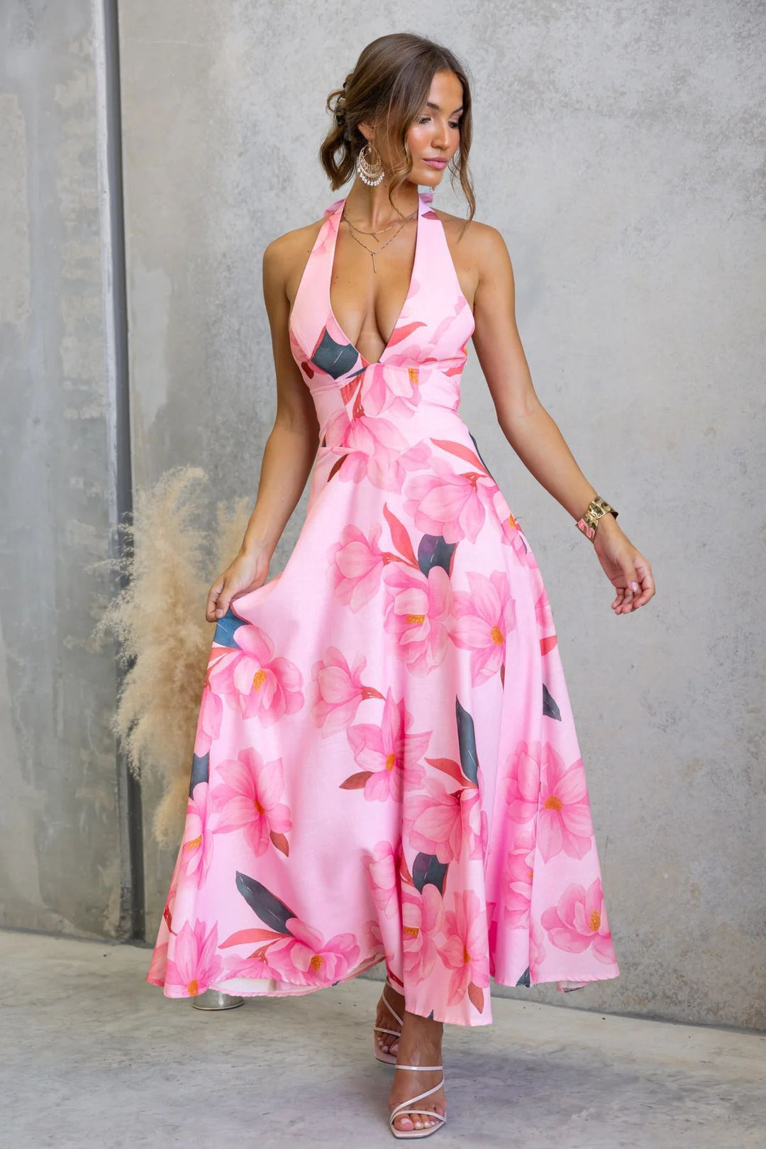 Ladies max dress with deep V-neckline and floral accents Lune London