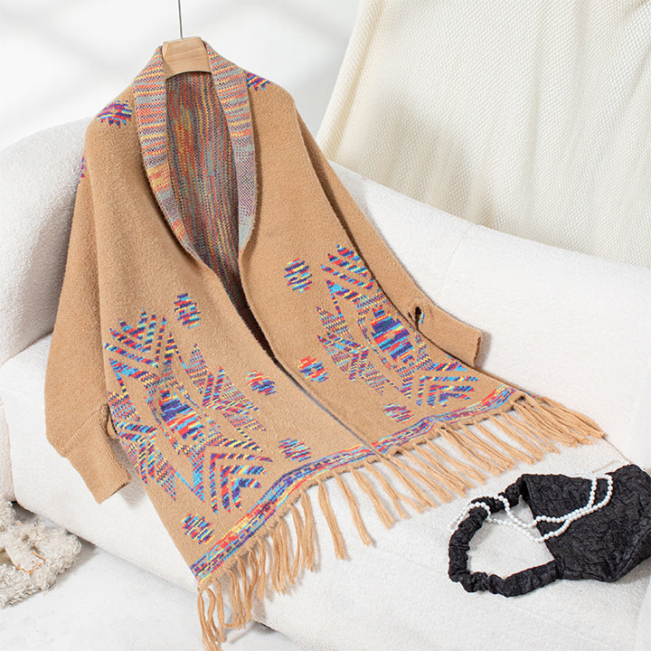 Wool poncho for women with colorful Navajo pattern and fringed hem Lune London