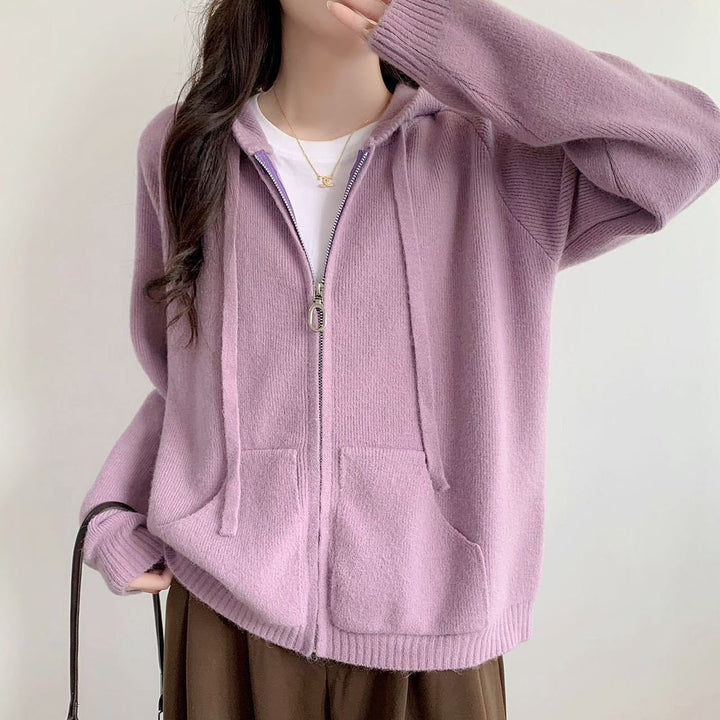 Veste à capuche pour femmes surdimensionnée avec une coupe courte et des poches pratiques Chic & Stil