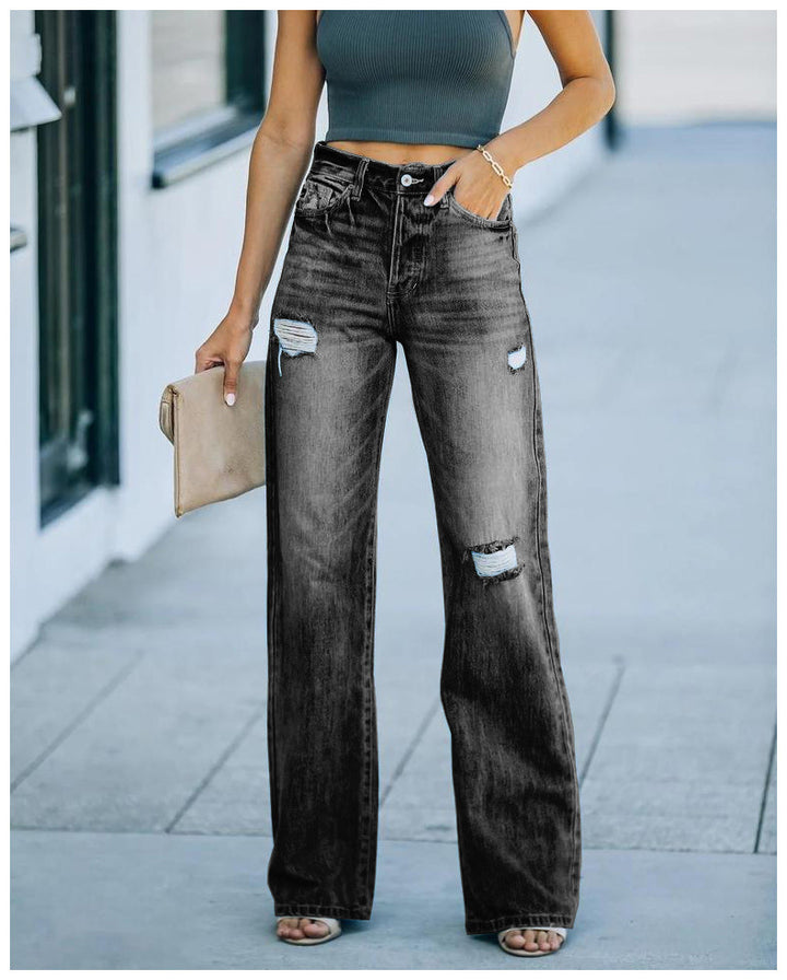 Women's wide-cut jeans with distressed effects and high waist