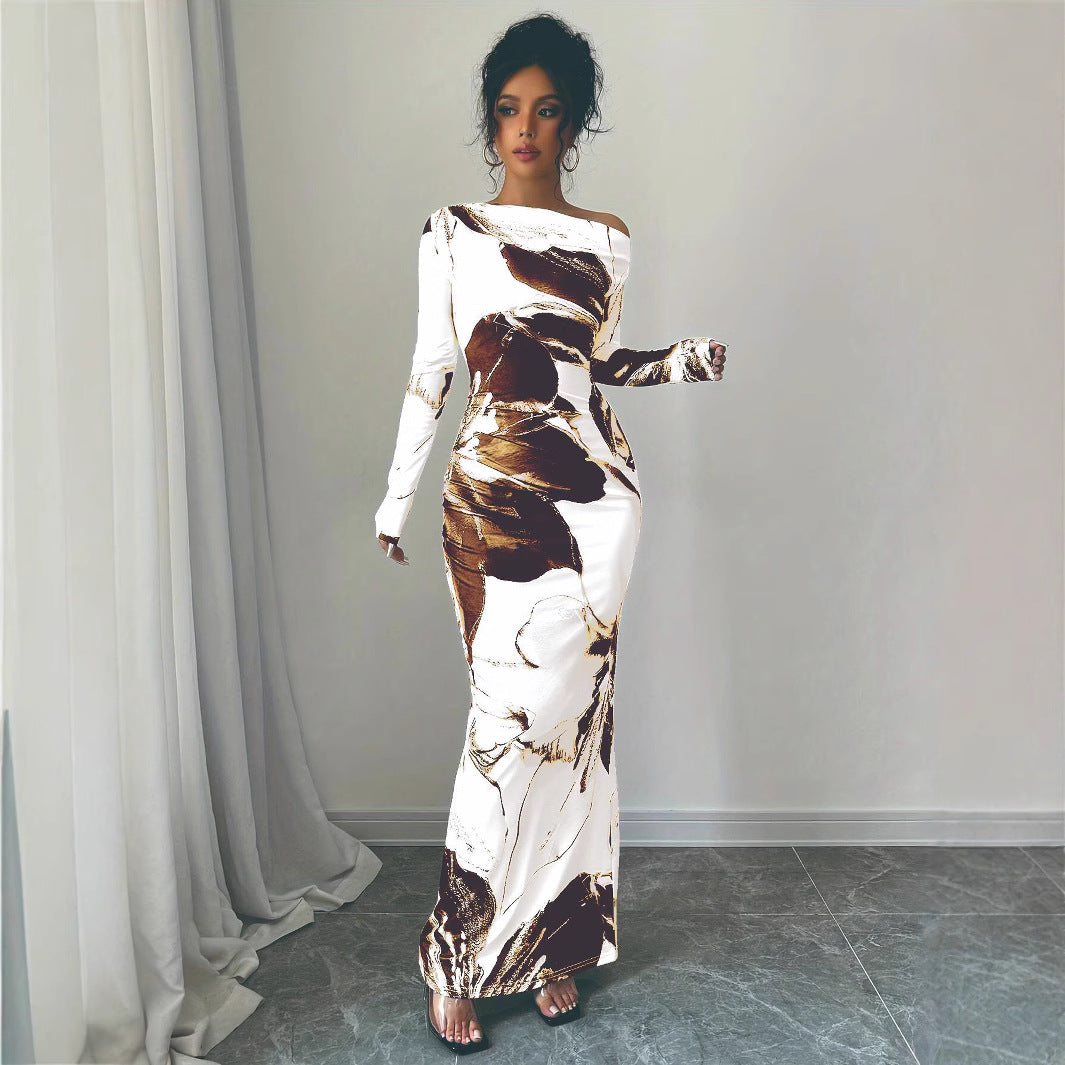 Ladies Elegant Maxi Dress with asymmetrical neckline and floral design Lune London