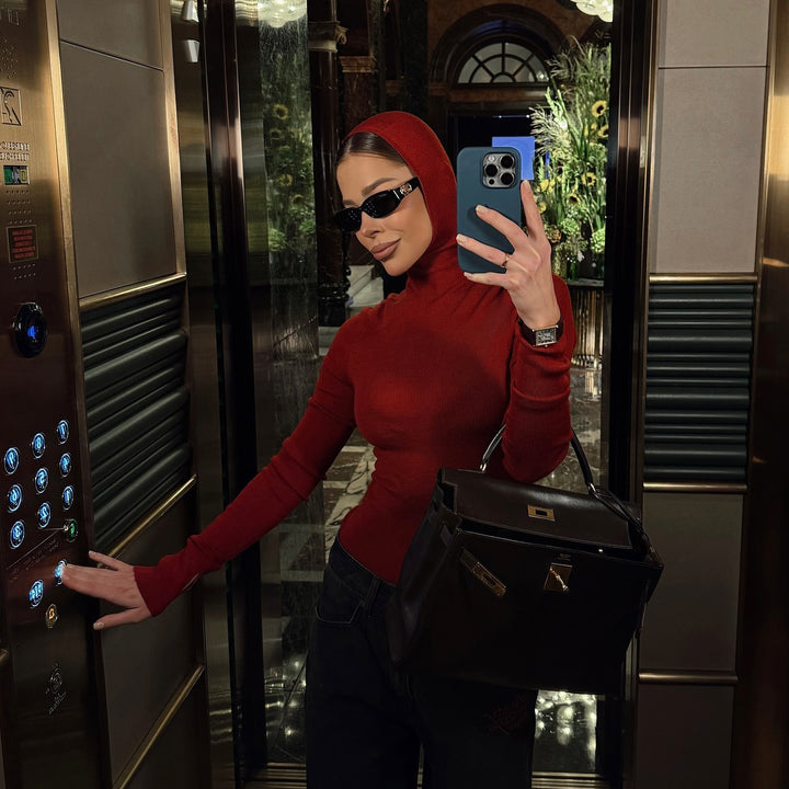 Women's fitted long sleeve top with high collar and thumb openings Lune London